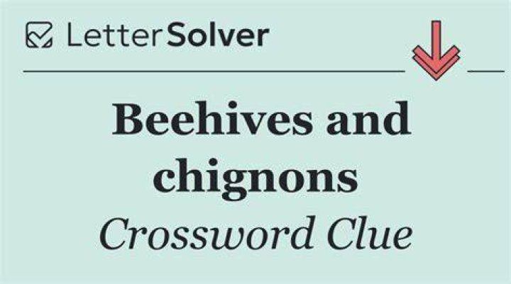 Beehives and buns Crossword Clue