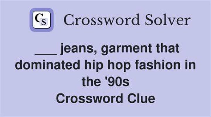 Body art that might be revealed by hip-hugger jeans Crossword Clue