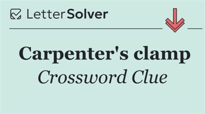 Carpenter’s wedge Crossword Clue