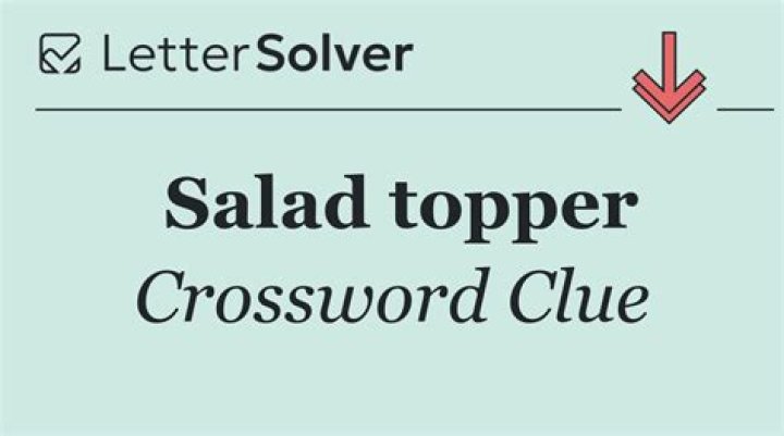 Crumbly salad topper Crossword Clue