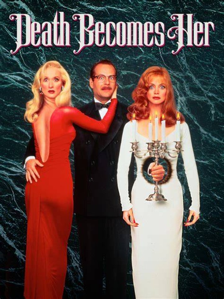 “Death Becomes Her” co-star, 1992 Crossword Clue