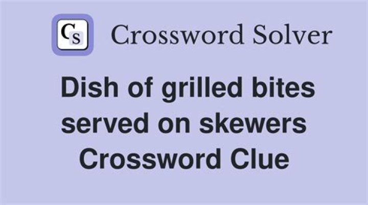 Dish served on a skewer Crossword Clue