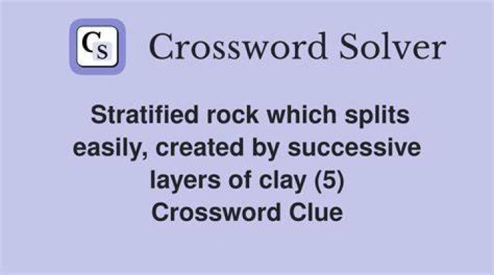 Easily split rock Crossword Clue