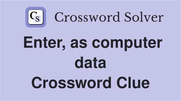 Enters, as data Crossword Clue