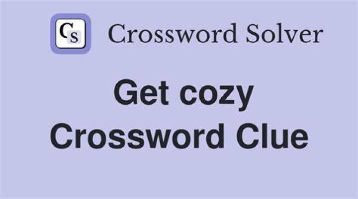 Get cozy (with) Crossword Clue