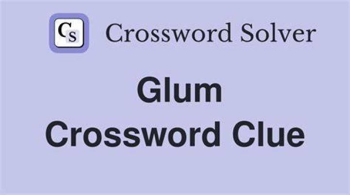 Glum drops Crossword Clue