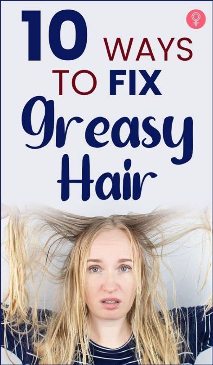 Greasy hairstyling product Crossword Clue