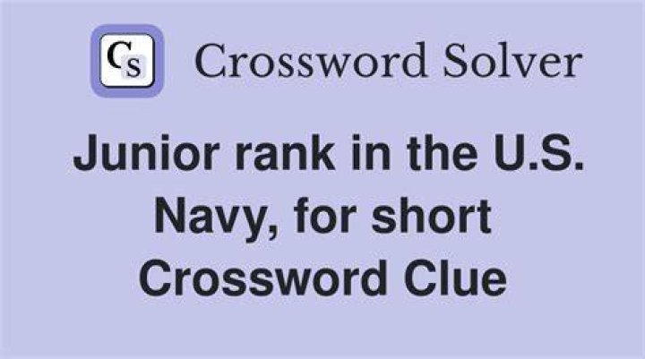 Hairstyle that’s cut short on the sides Crossword Clue