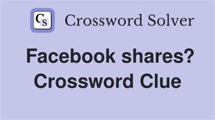 Identifies, as in a Facebook photo Crossword Clue