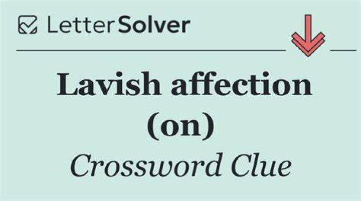 Lavish affection (on) Crossword Clue