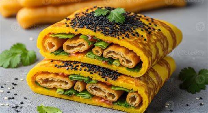 Main component in the Chinese street food jianbing Crossword Clue