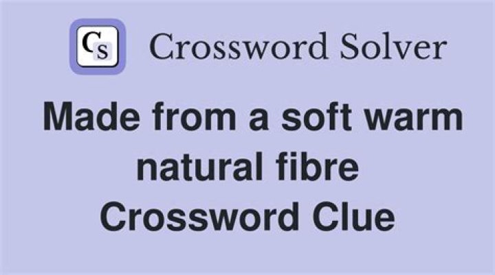 Mat made of soft rush Crossword Clue