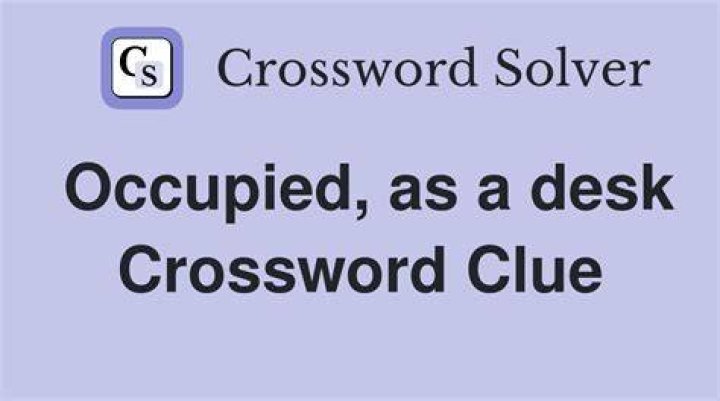 Occupied, as a table Crossword Clue