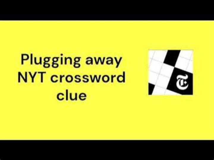 Plugging away Crossword Clue