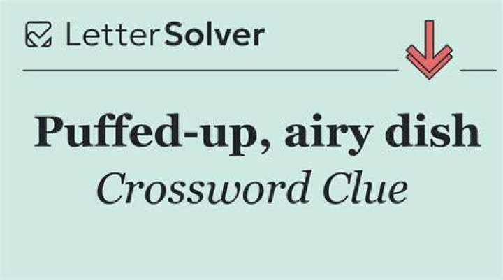 Puffed up Crossword Clue