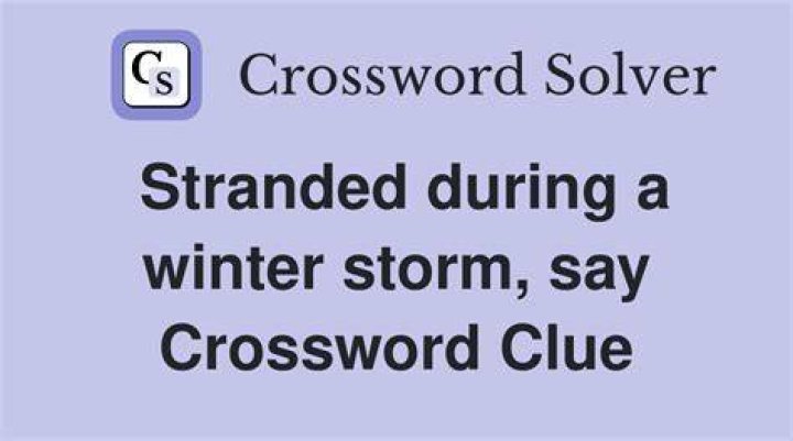 Strand, as during a winter storm Crossword Clue