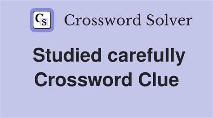 Studied carefully, with “over” Crossword Clue