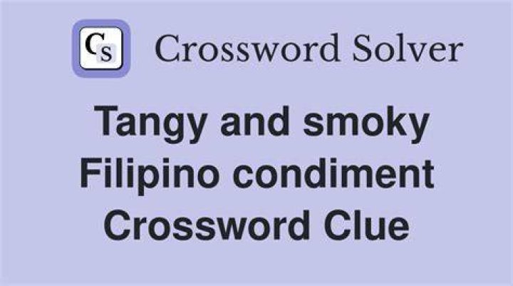 Tangy condiment Crossword Clue