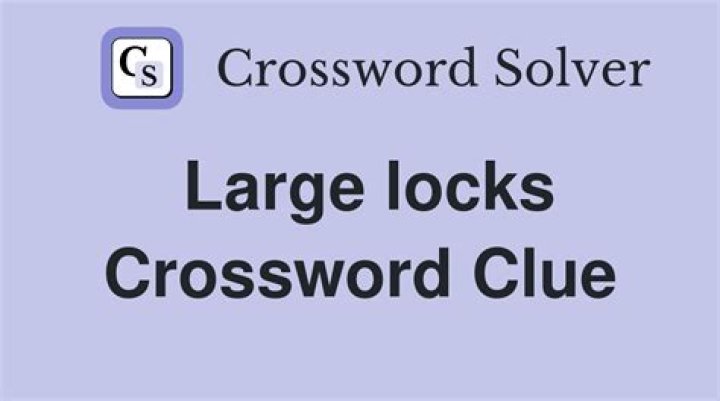 Thick locks Crossword Clue
