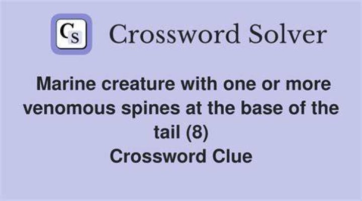 Venomous predator with a vibrating tail Crossword Clue