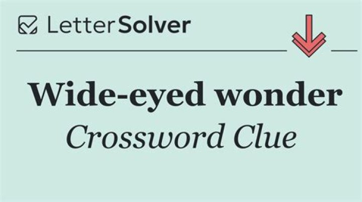 Wide-eyed in wonder Crossword Clue