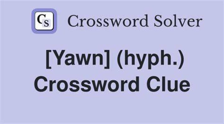 With a yawn, say Crossword Clue